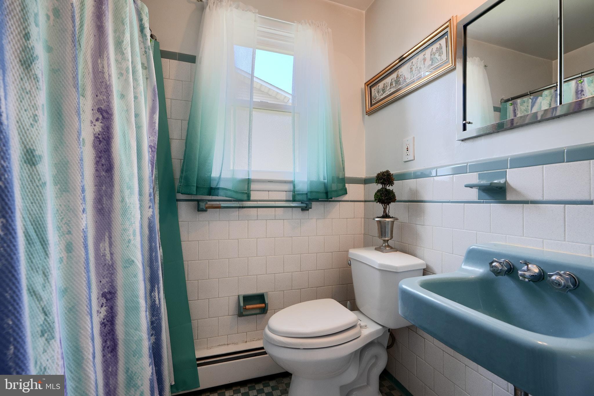 8003 Highpoint Road Parkville, MD 21234 - Photo 15 of 29 1st floor bathroom