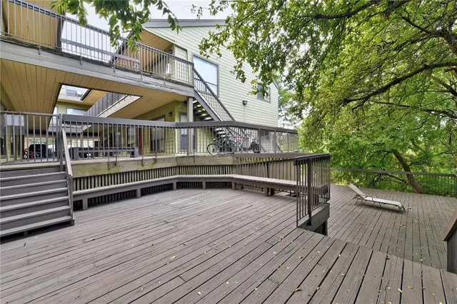 a view of wooden deck with a yard