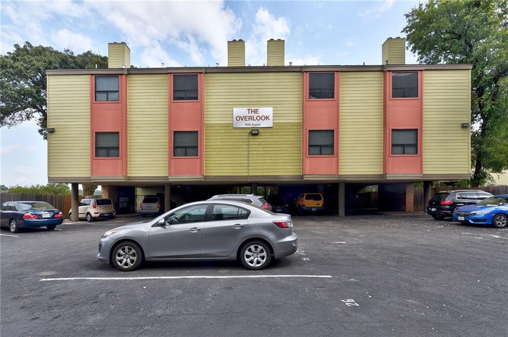 908 Poplar Street, Unit 204 Austin, TX 78705 - Photo 15 of 15 a car parked in front of a house