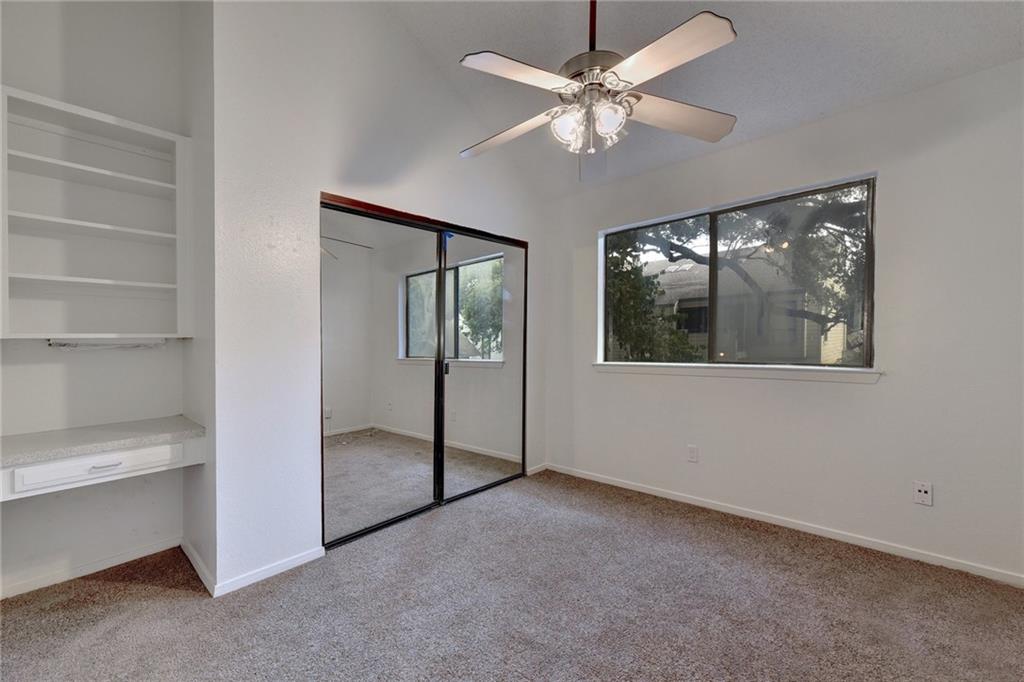 908 Poplar Street, Unit 204 Austin, TX 78705 - Photo 10 of 15 a view of an empty room with a window