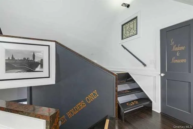 a view of wooden floor and stairs