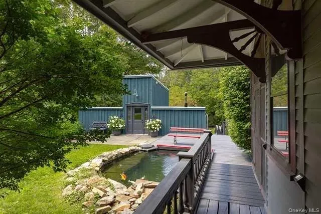 a view of swimming pool with outdoor seating