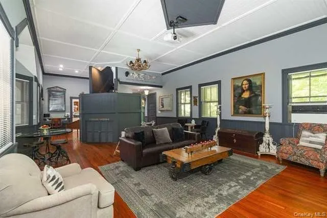 a living room with furniture and a couch