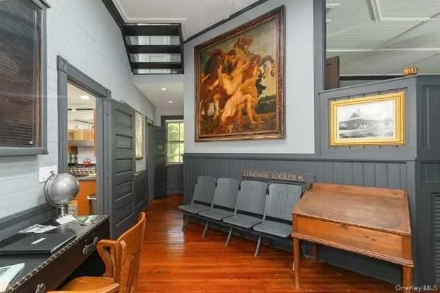 a bedroom with furniture and window