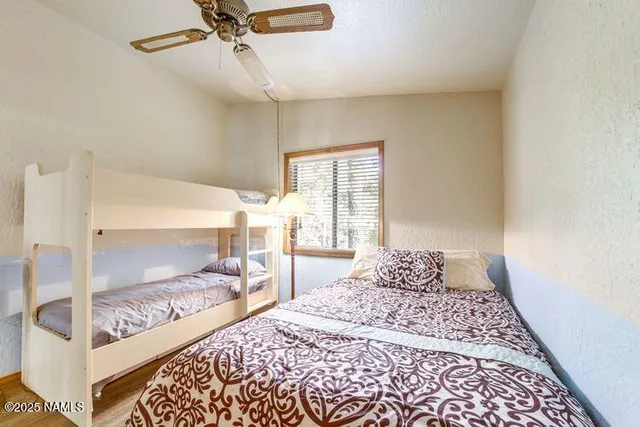 a view of a car parked in front of house