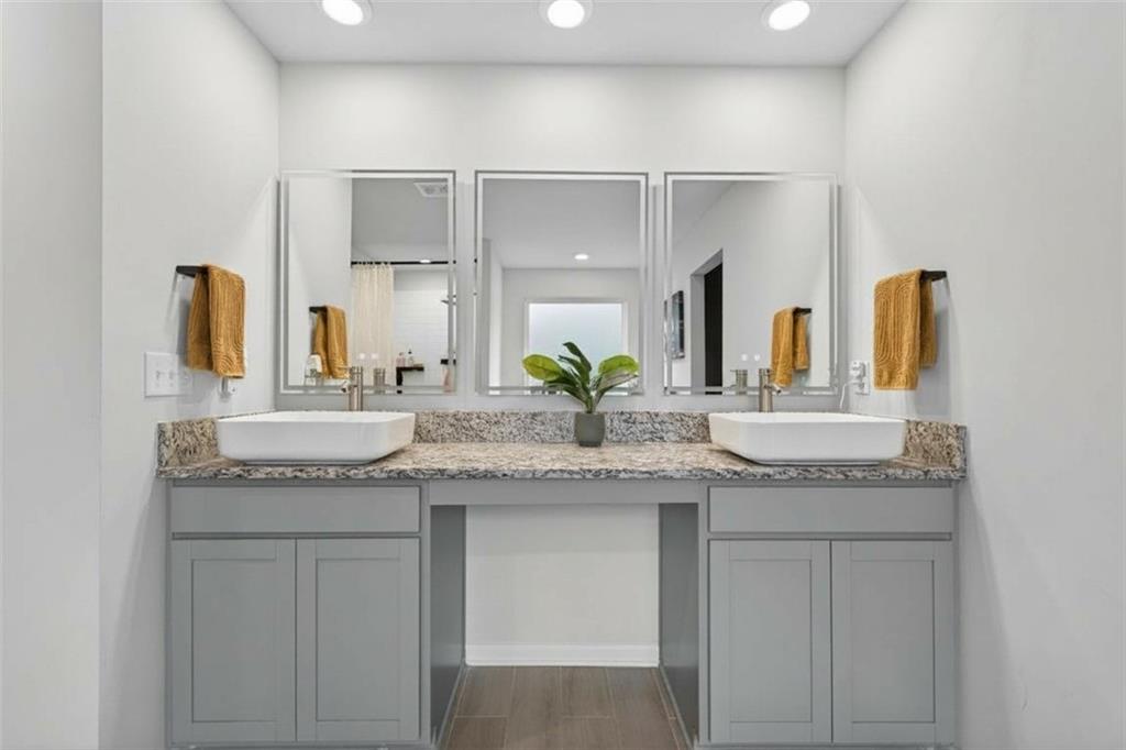 480 Overlook Road Covington, GA 30014 - Photo 8 of 20 a bathroom with a granite countertop sink and a mirror