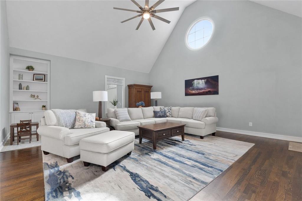 295 Springwater Chase Newnan, GA 30265 - Photo 14 of 68 a living room with furniture and a rug