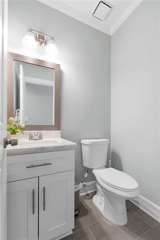 295 Springwater Chase Newnan, GA 30265 - Photo 21 of 68 a bathroom with a granite countertop toilet sink and mirror