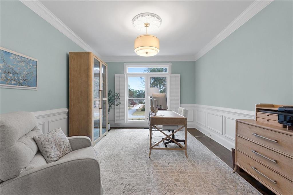 295 Springwater Chase Newnan, GA 30265 - Photo 23 of 68 a living room with furniture and a window