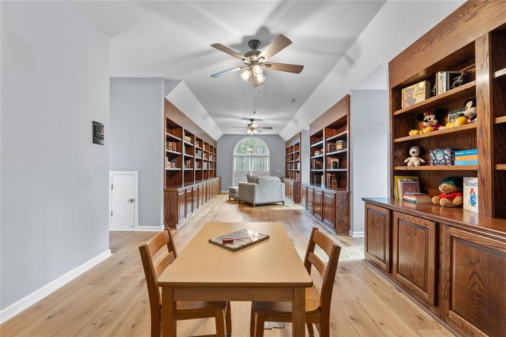295 Springwater Chase Newnan, GA 30265 - Photo 36 of 68 a view of a dining room with furniture window and wooden floor