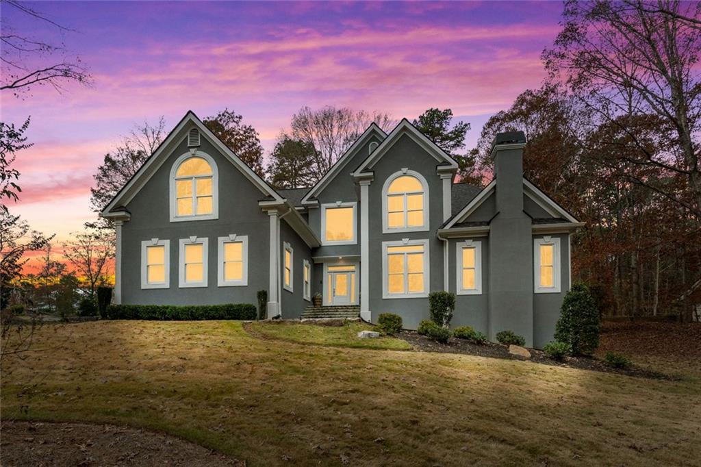 295 Springwater Chase Newnan, GA 30265 - Photo 4 of 68 a front view of a house with a yard