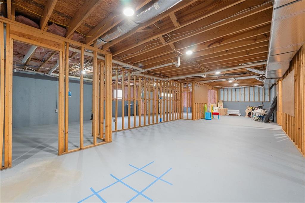 295 Springwater Chase Newnan, GA 30265 - Photo 53 of 68 a view of empty room with wooden walls