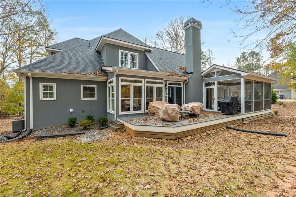 295 Springwater Chase Newnan, GA 30265 - Photo 57 of 68 a front view of a house with a yard