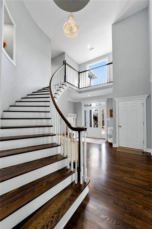 295 Springwater Chase Newnan, GA 30265 - Photo 8 of 68 a view of entryway livingroom and hall with wooden floor