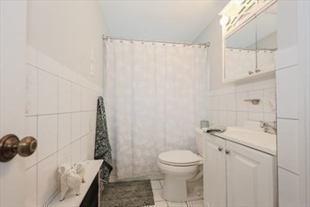 34 Brookline Avenue Hull, MA 02045 - Photo 14 of 18 a bathroom with a sink a toilet and shower