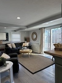 34 Brookline Avenue Hull, MA 02045 - Photo 15 of 18 a living room with furniture and a large window