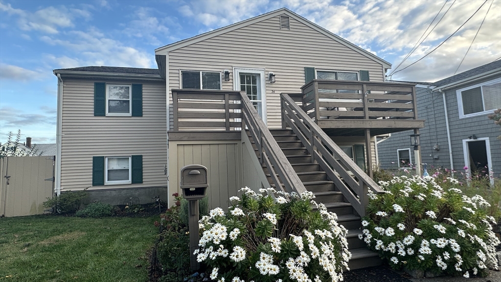 34 Brookline Avenue Hull, MA 02045 - Photo 4 of 18 a front view of a house with a garden