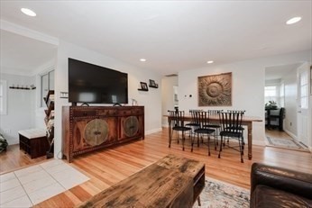 34 Brookline Avenue Hull, MA 02045 - Photo 7 of 18 a living room with furniture and a flat screen tv