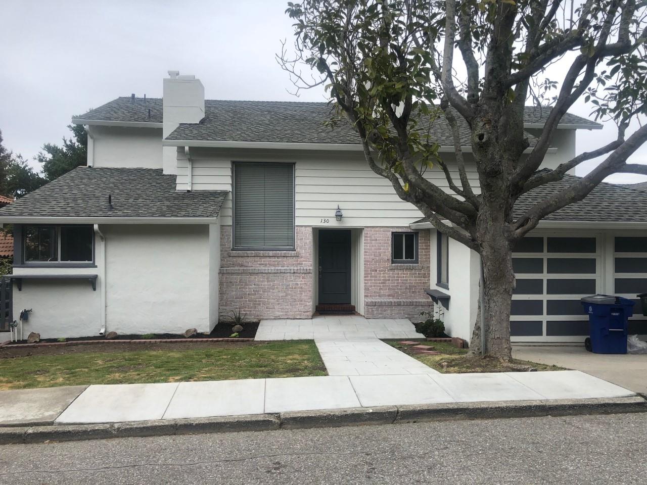 130 El Bonito Way Millbrae, CA 94030 - Photo 1 of 48 a front view of a house with a yard and garage