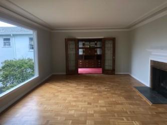 130 El Bonito Way Millbrae, CA 94030 - Photo 14 of 48 a view of an empty room with wooden floor and a fireplace