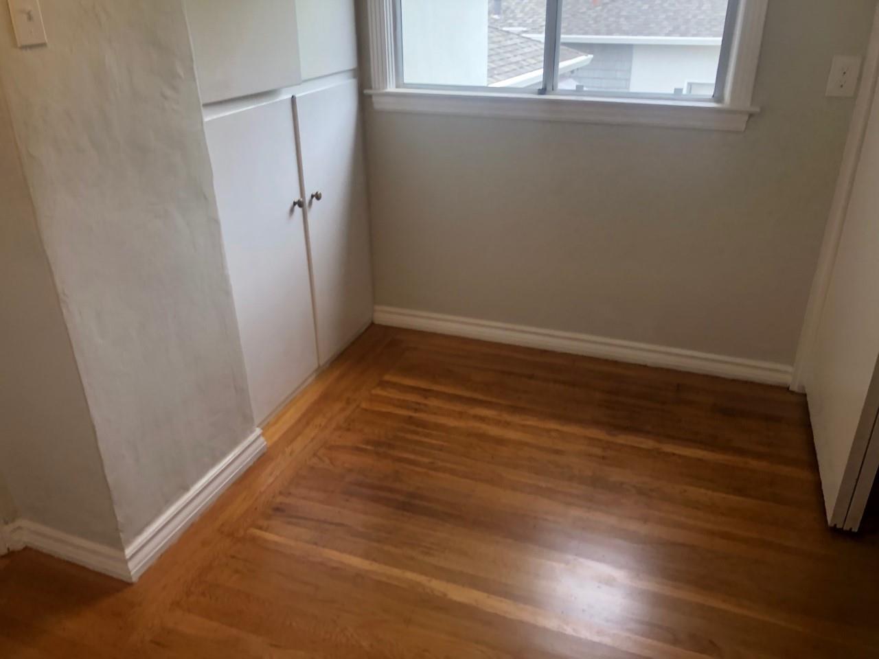 130 El Bonito Way Millbrae, CA 94030 - Photo 32 of 48 a view of a small space with wooden floor and a window