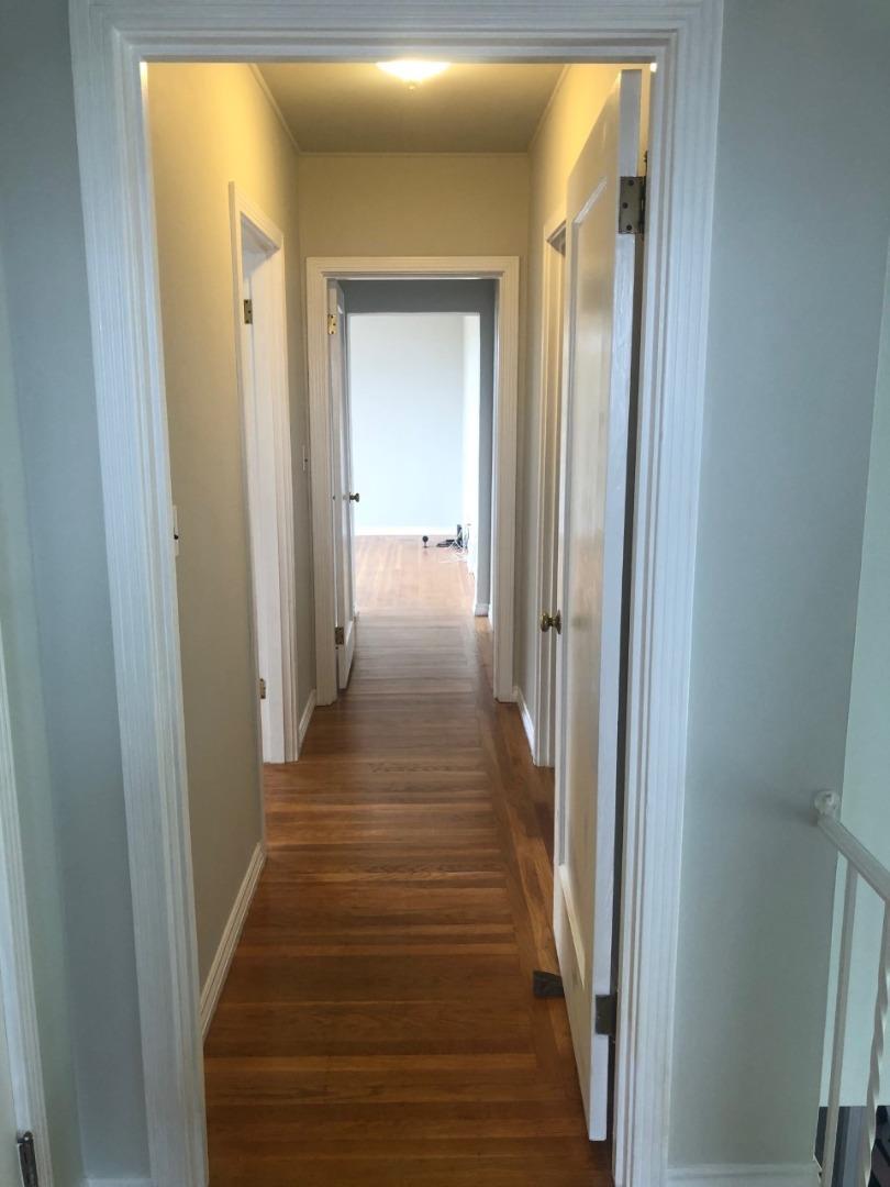 130 El Bonito Way Millbrae, CA 94030 - Photo 35 of 48 a view of a hallway with wooden floor