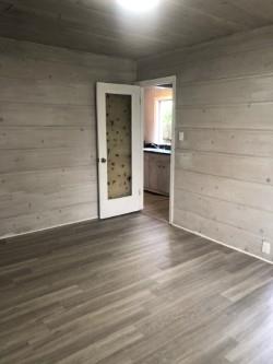 130 El Bonito Way Millbrae, CA 94030 - Photo 36 of 48 a view of a room with wooden floor and a kitchen space