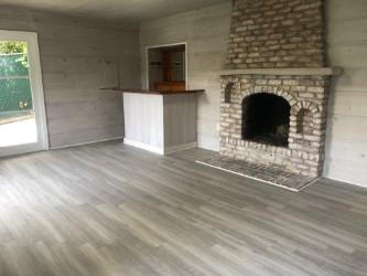 130 El Bonito Way Millbrae, CA 94030 - Photo 45 of 48 a view of an empty room with wooden floor and a fireplace