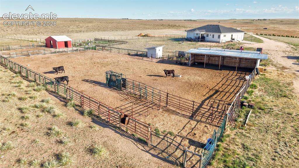 40051 Cold Iron Road Rush, CO 80833 - Photo 42 of 50 Back of house with outbuildings