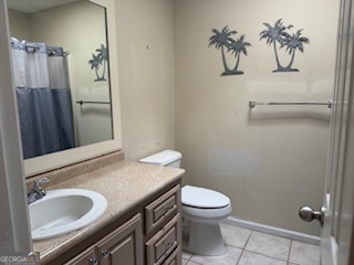 120 Mossydale Lane Albany, GA 31721 - Photo 12 of 20 a bathroom with a granite countertop sink a toilet and a tub