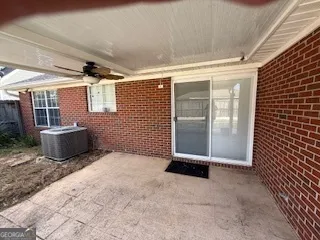 a view of a porch with wooden floor