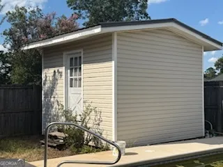 a view of a back yard of the house