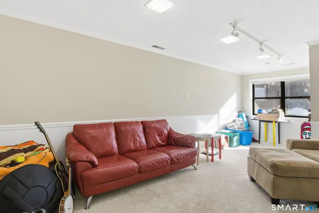 a living room with furniture and a couch