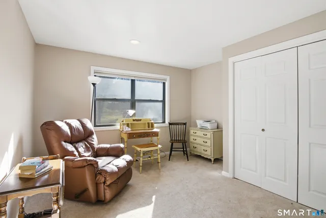 a room with furniture and a window