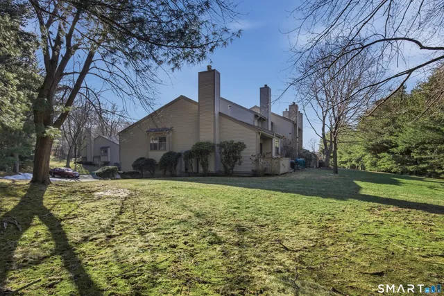 a house view with garden space