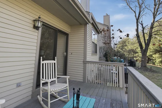 a view of a chair in the balcony