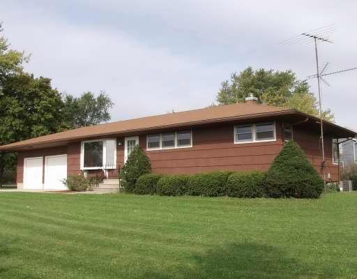 44W980 Main Street Road Elburn, IL 60119 - Photo 1 of 1 a front view of house with yard and green space