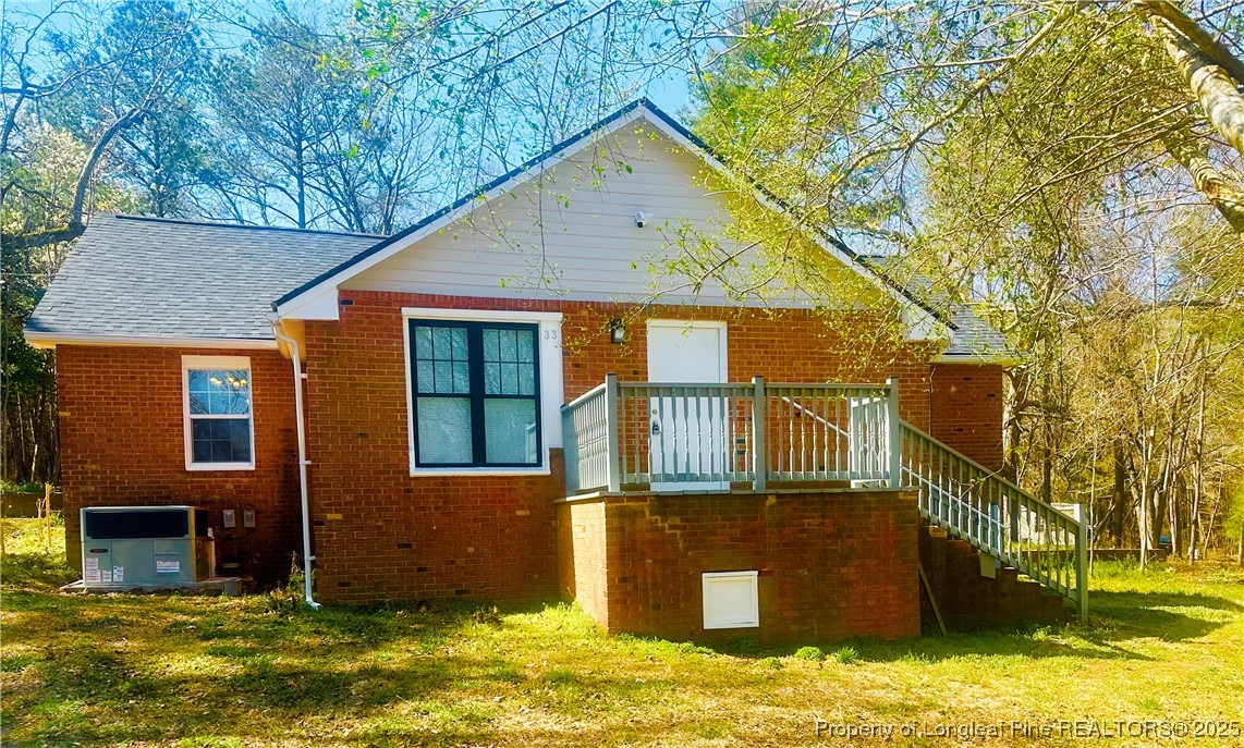 33 Alberta Lane Cameron, NC 28326 - Photo 14 of 14 a front view of house with yard