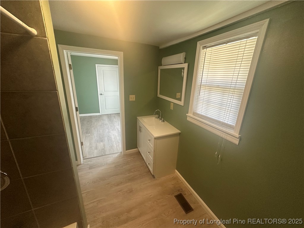 33 Alberta Lane Cameron, NC 28326 - Photo 8 of 14 a bathroom with a toilet and a sink
