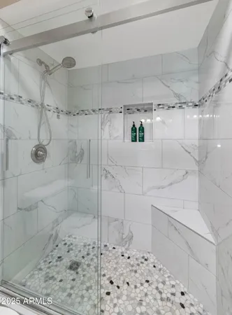 a view of a balcony with furniture