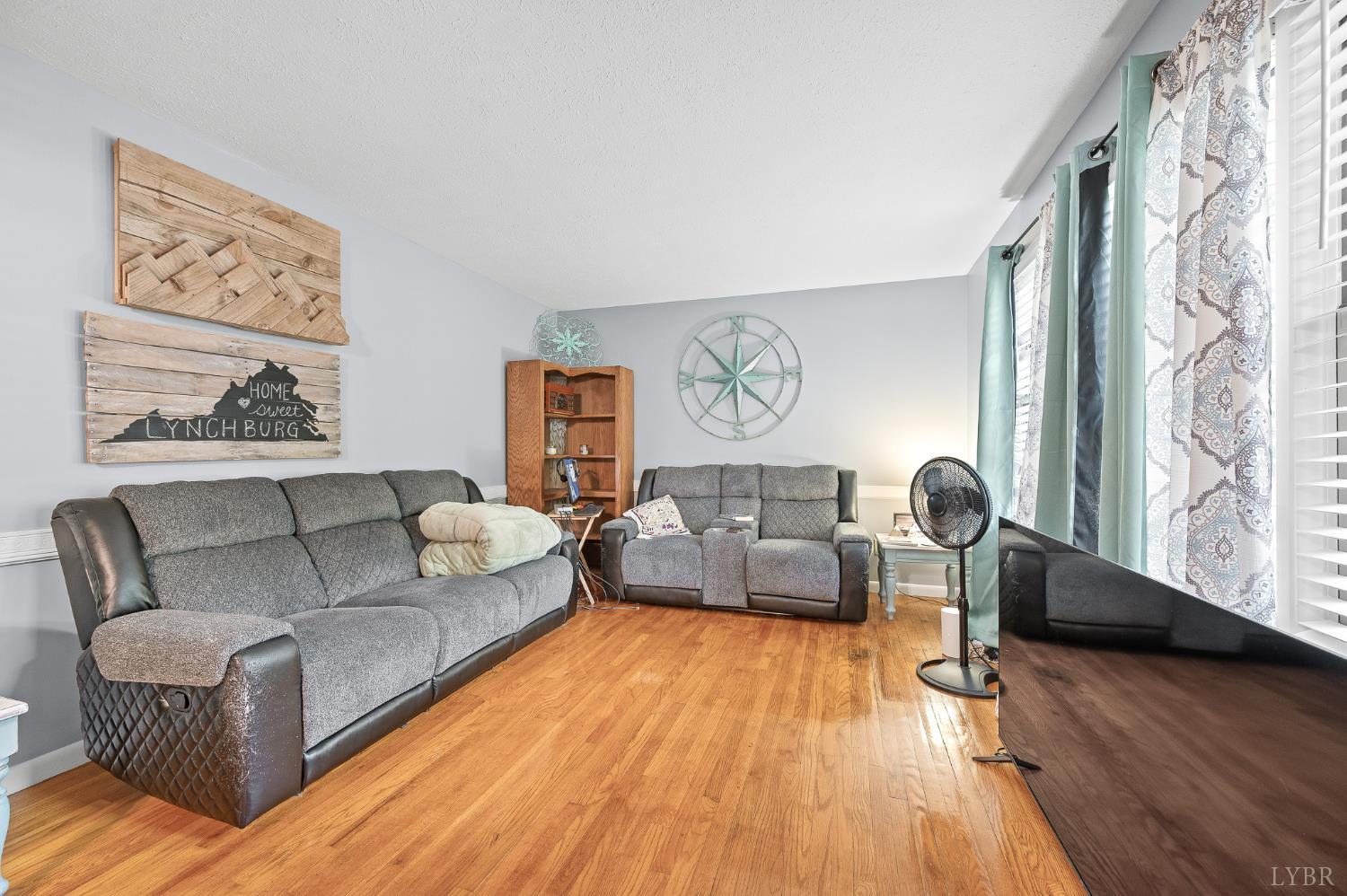 969 Hawkins Road Evington, VA 24550 - Photo 2 of 40 The living room is just off the front door entrance