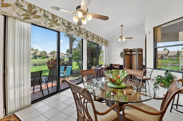 a front view of a house with garden and porch
