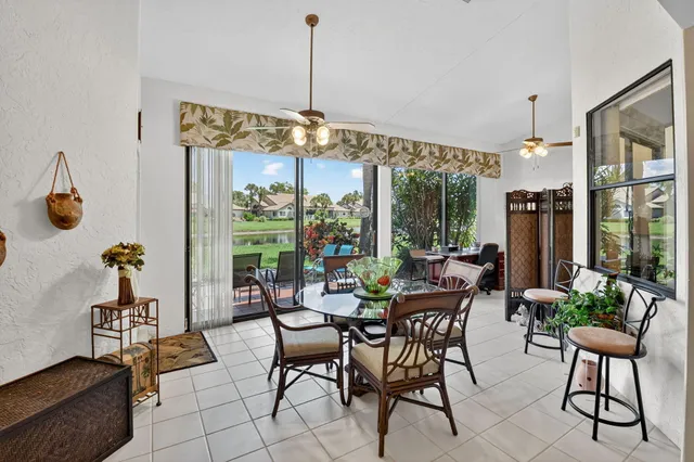 a view of a lake with houses in the back