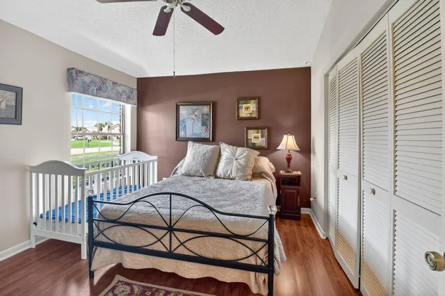 an aerial view of a house with garden space and street view