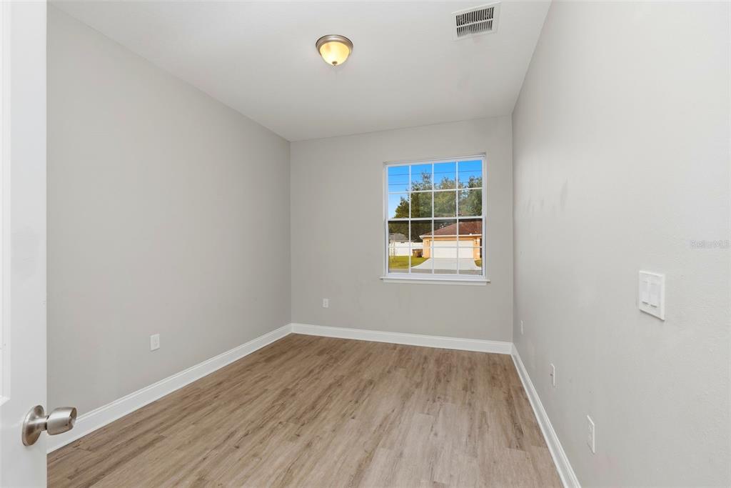 314 Colonade Court, Unit A Kissimmee, FL 34758 - Photo 20 of 24 an empty room with a window