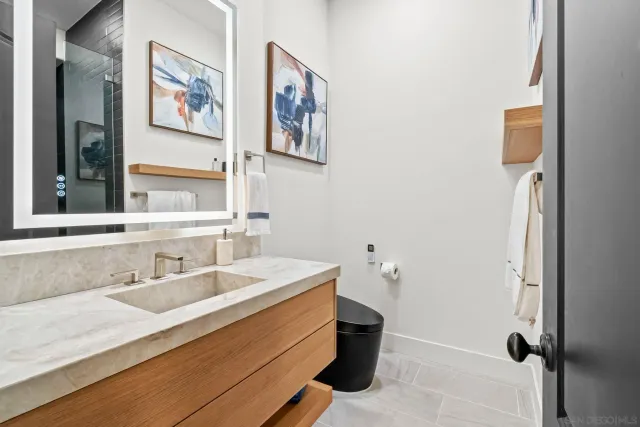 a view of a house with a porch and furniture