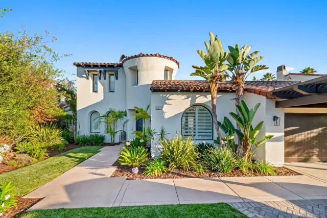 a utility room with sink dryer and washer