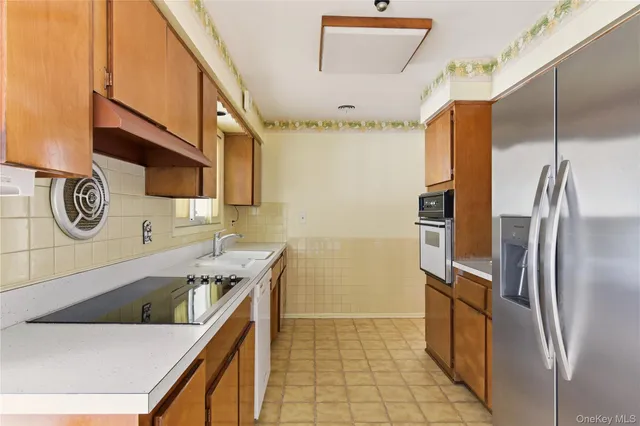 $1,899,000 | 75 Mimosa Drive, East Hills, NY 11576