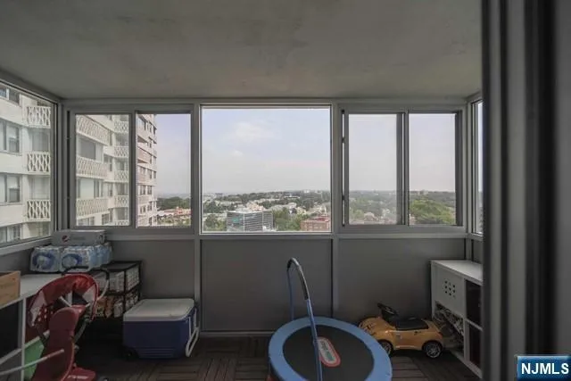 a room with furniture and a window