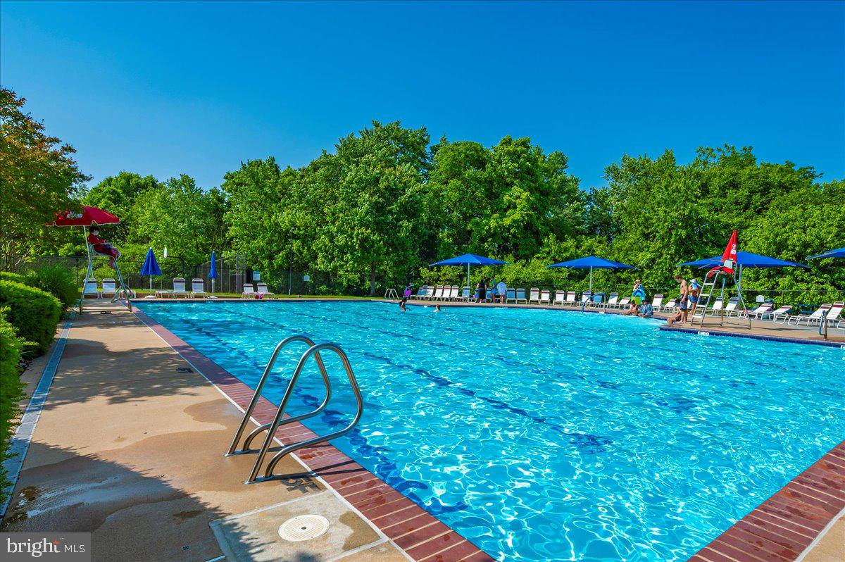 2500 Waterside Drive, Unit 110 Frederick, MD 21701 - Photo 102 of 106 a view of a swimming pool with an outdoor space